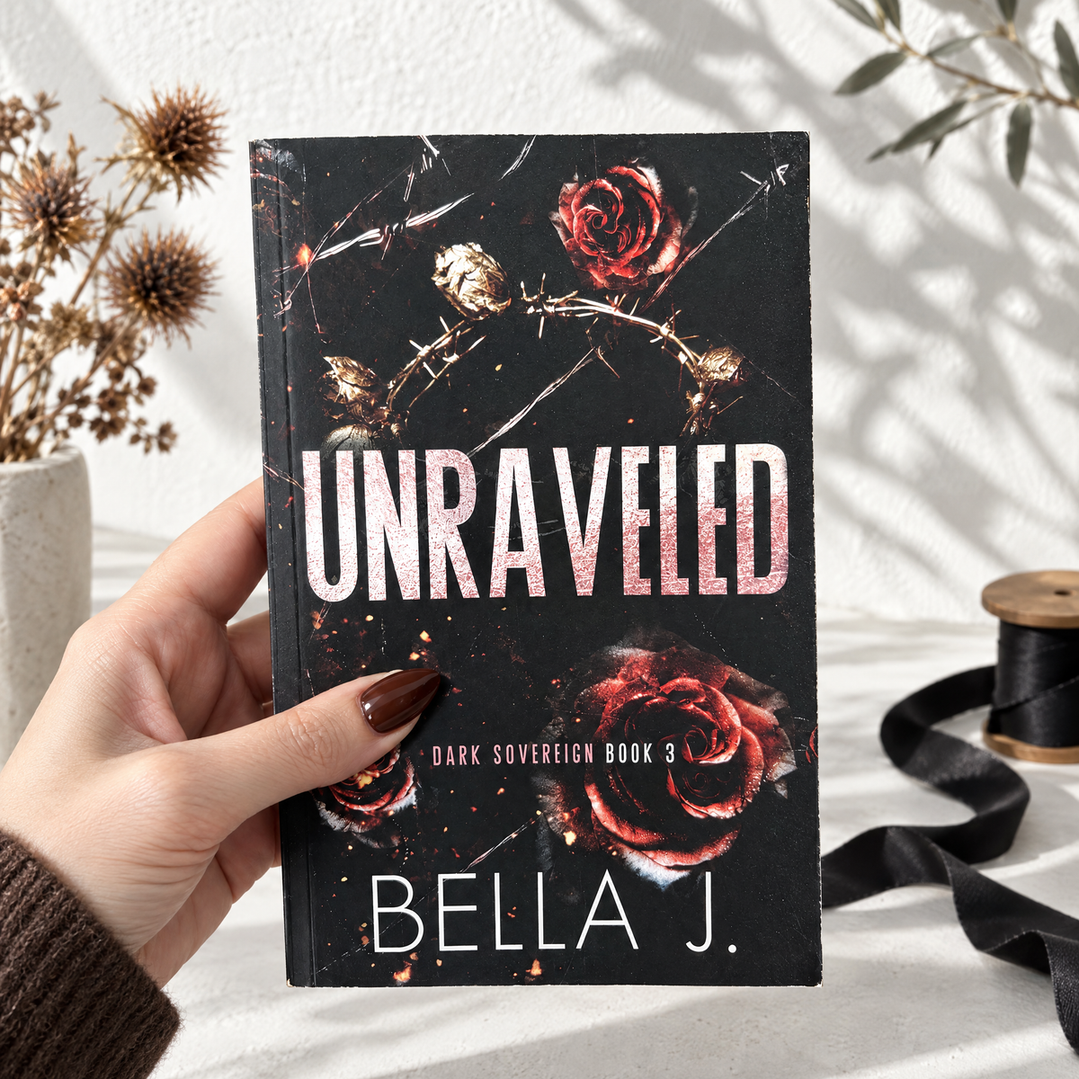 Unraveled by Bella J. signed paperback, discreet cover